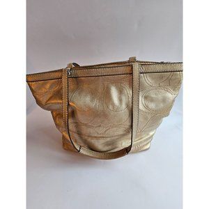 Coach gold tote.  K1120-F18877 with the Signature C